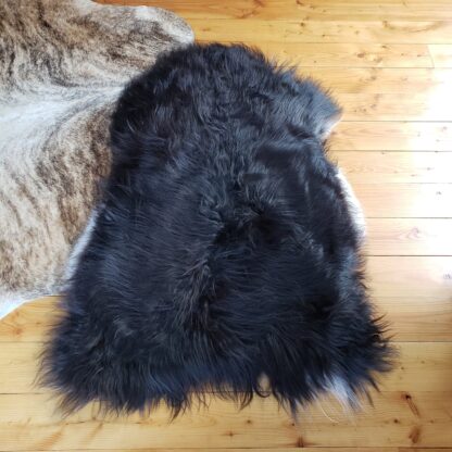 large black icelandic sheepskin rug