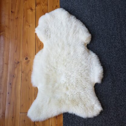 Sheepskin rug on floor