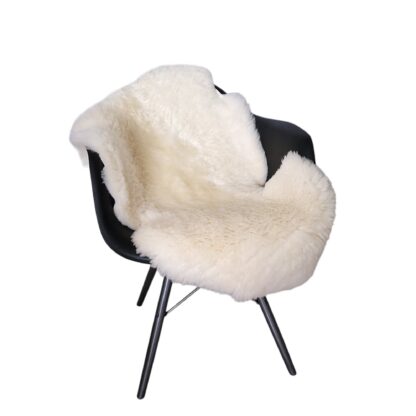 Sheepskin throw on chair