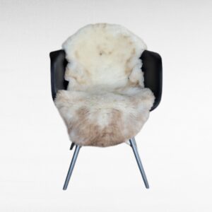 Natural Beige + Tan Sheepskin fur Rug on Chair used as a throw