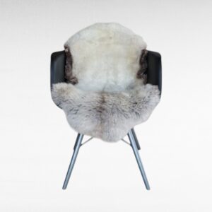 Natural gray Sheepskin fur Rug on Chair used as a throw