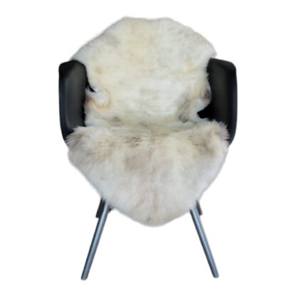 Sheepskin rug, natural on a chair