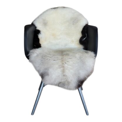 Sheepskin rug, natural on a chair