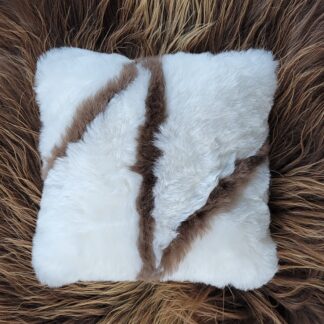 Throw pillow Cover made with sheepskin that's white and brown