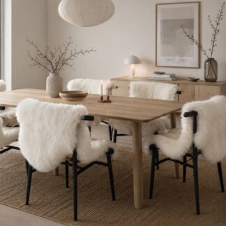 Ivory white Icelandic lambskins shown in a Nordic dining area used to add style and texture & warmth to the room