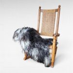 Sheepskins - What are people using them for? Sheepskin draped over arm and seat of wooden rocking chair