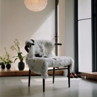Cozy chair with real lambskin made out of purebred Icelandic sheep skins that were organically raised in Iceland
