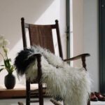 Sheepskins - What are people using them for? Cozy rocking chair with sheepskin blanket.