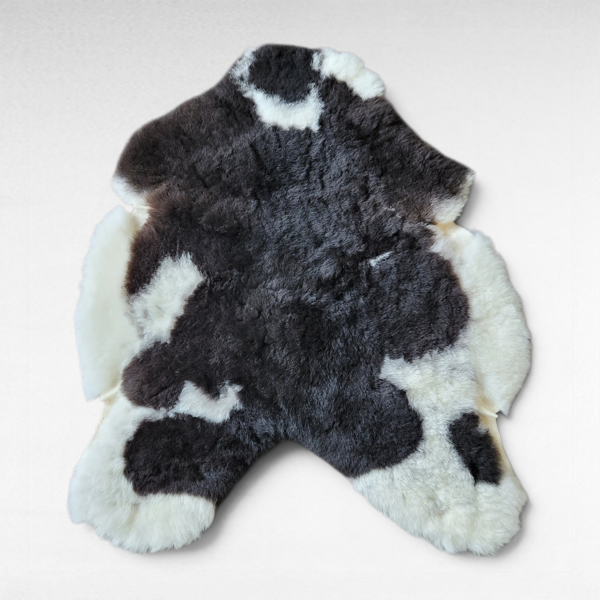 Short Wool X-Wide Icelandic Lambskin Rug Black + White (42" x 37") Short Wool X-Wide Icelandic Lambskin Rug Black + White (42" x 37") - Image 3