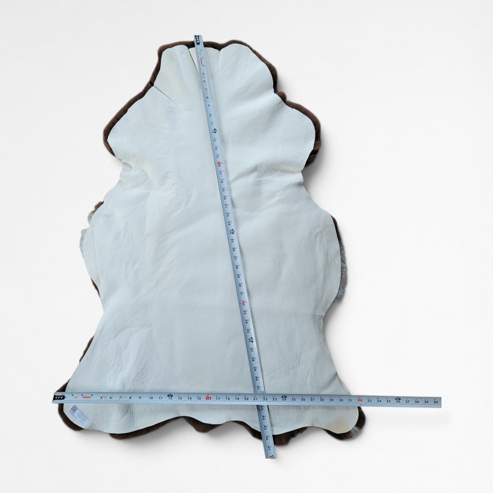 Rare Breed British Lambskin Throw – Bright Brown & White Spotted 47" x 32" - Image 5