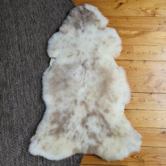 Ivory with Light Tan Spots Portland Sheepskin Rug 48″ x 32″