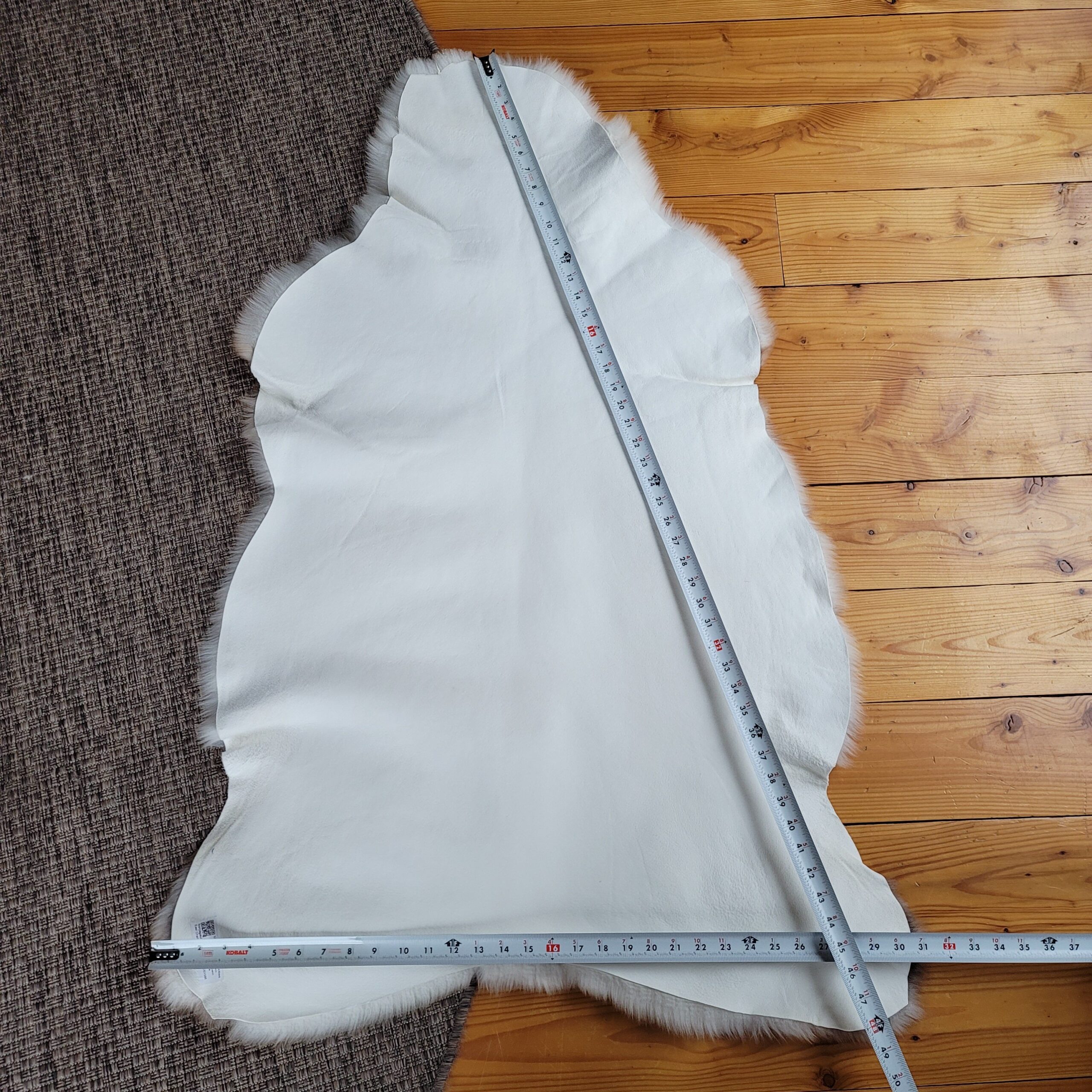 Ivory & Fawn Taupe Portland Sheepskin Rug 48″ x 32″ - Image 5