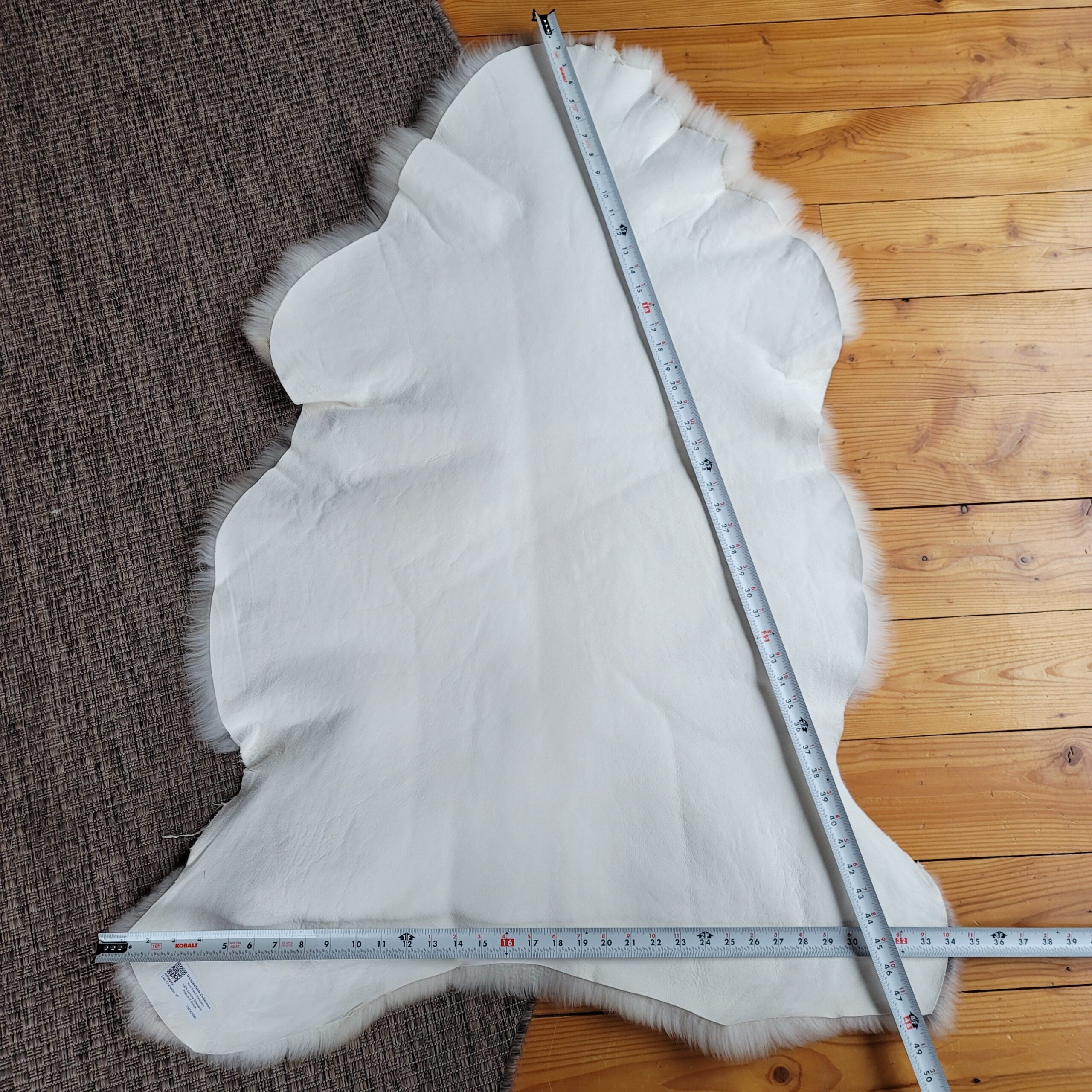 Ivory & Oatmeal Taupe Portland Sheepskin Rug 48″ x 34″ - Image 5