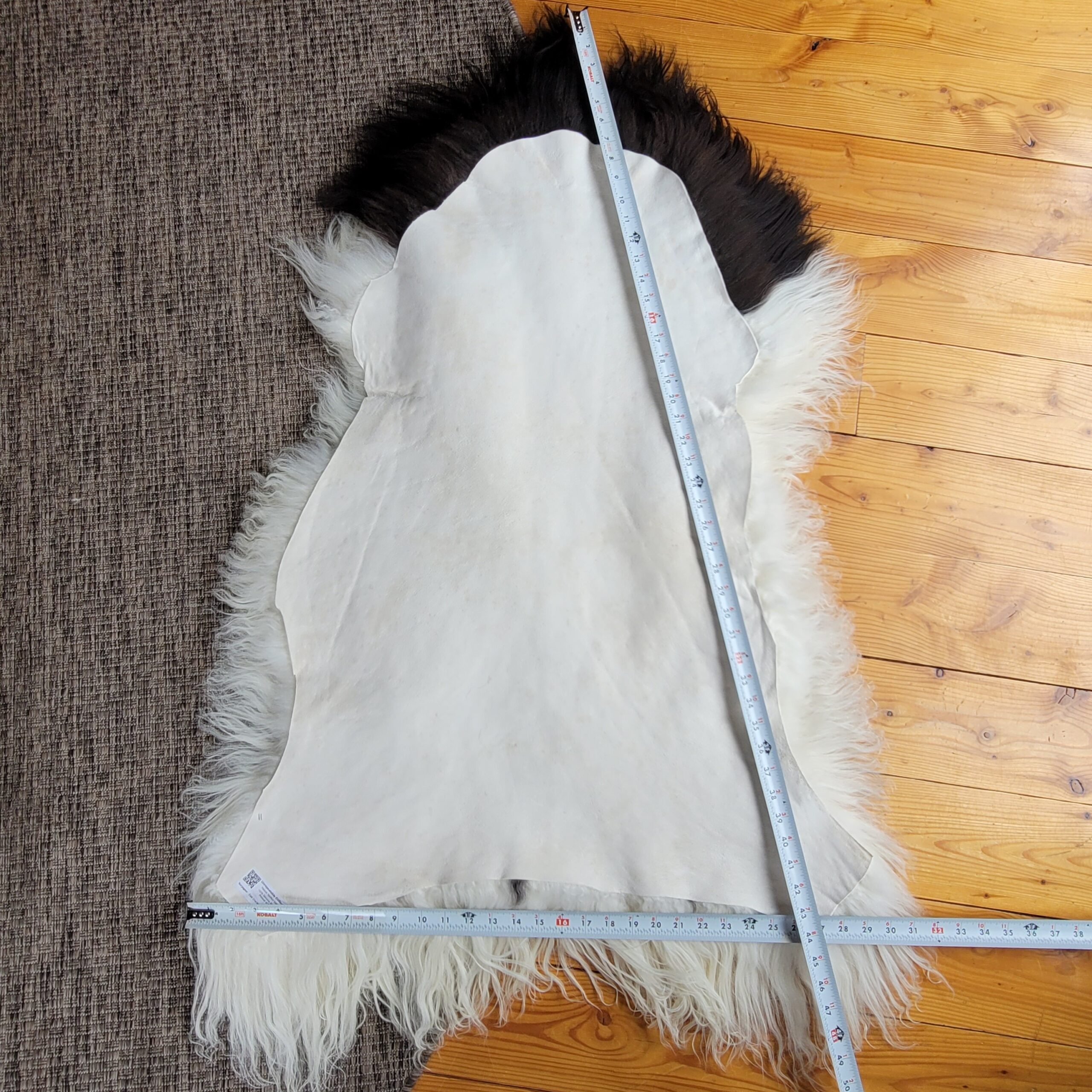 Dark Brown Spotted Ecru Icelandic Sheepskin Rug 50″ × 32″ - Image 5
